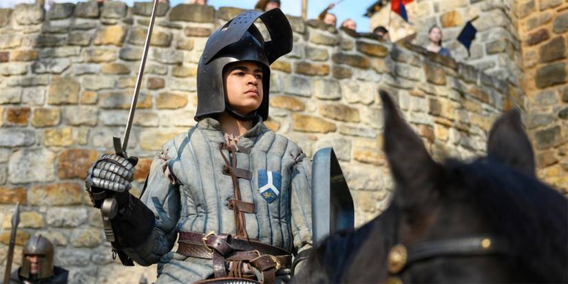 Tiuri (Amir Wilson) swings a sword on horseback in The Letter for the King