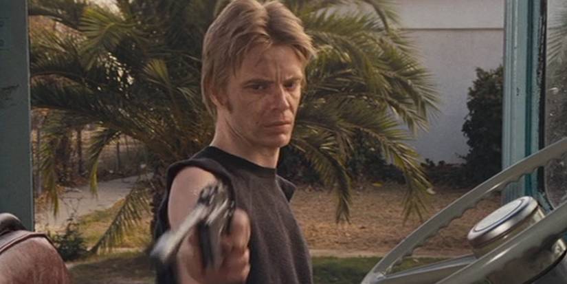 Gang member pointing a gun in the ice cream scene from ᴀssault On Precinct 13