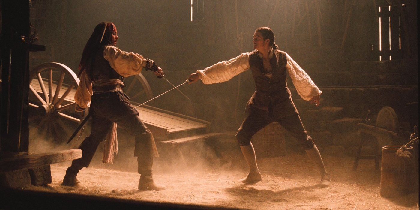 Johnny Depp and Orlando Bloom as Jack Sparrow and Will Turner dueling in Pirates of the Caribbean: The Curse of the Black Pearl.