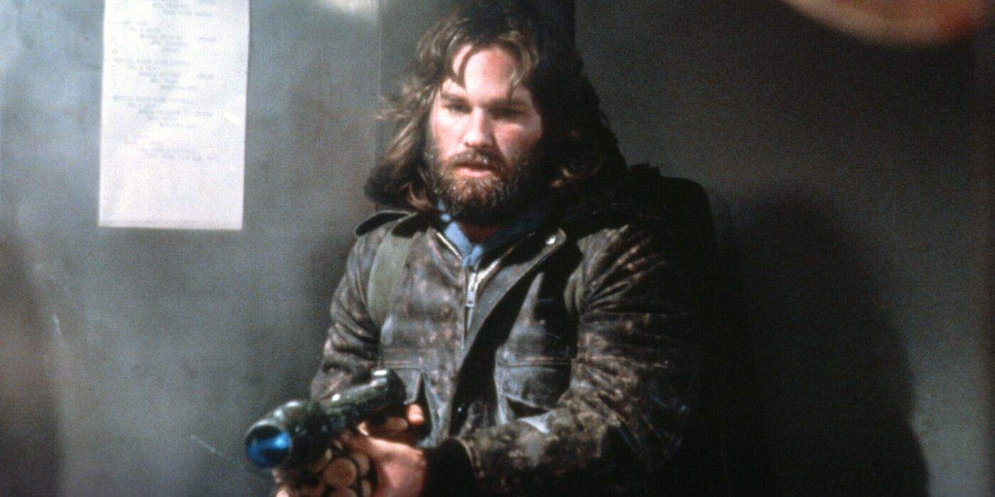 Kurt Russell as MacReady with a flamethrower (not in use) in The Thing 1982