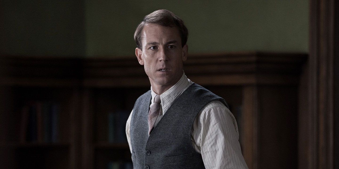 Frank Randall looks concerned on Outlander