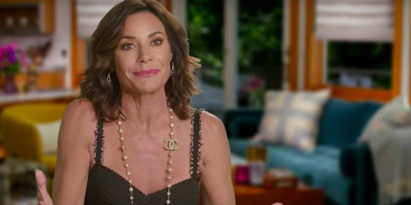 LuAnn in a black dress on RHONY