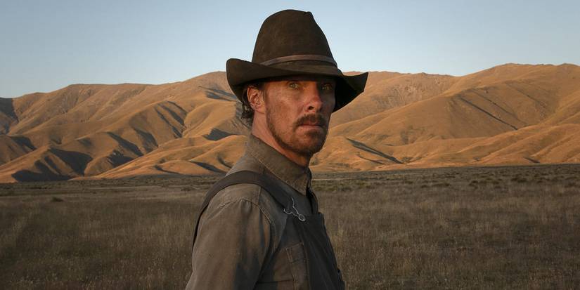 Phil standing outside in Power of the Dog.