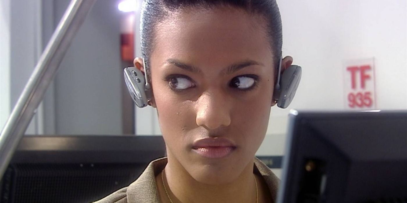 Freema Agyeman as Adeola with a Torchwood headset in Doctor Who.