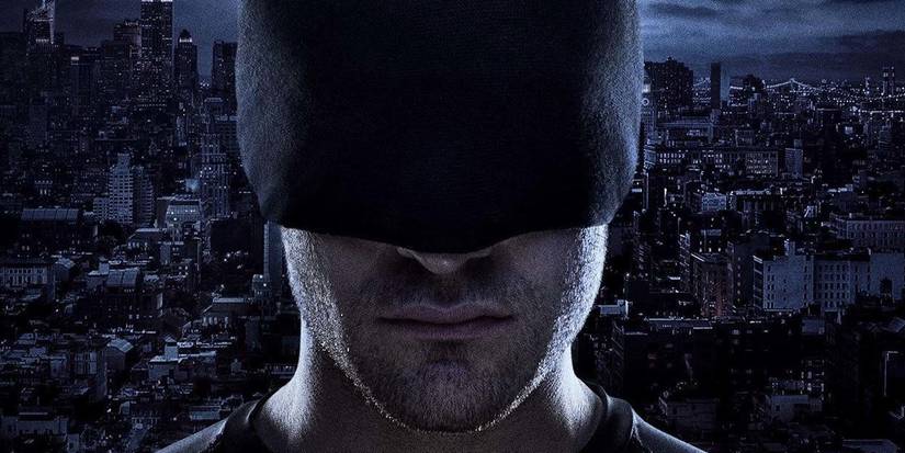 10 Greatest Superhero TV Masterpieces Of The Past 10 Years Daredevil with his black mask in front of cityscape in Daredevil Season 1 promo image