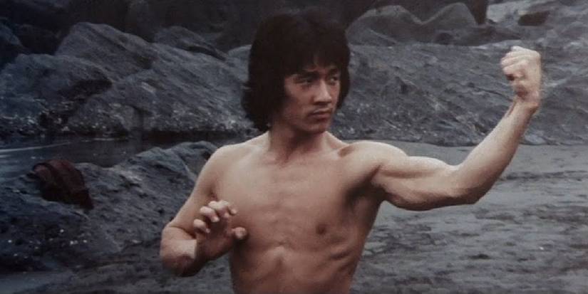 Jackie Chan New Fist of Fury shirtless practicing his kung fu strikes
