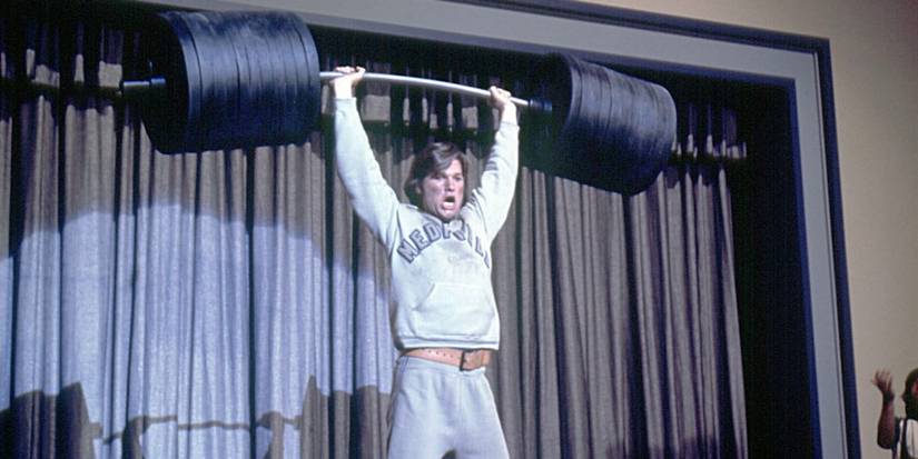 Dexter lifts huge weights onstage in The Strongest Man in the World