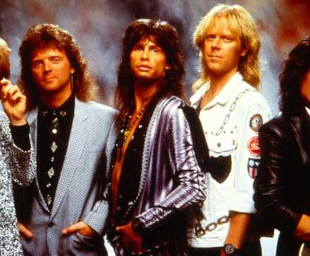 Aerosmith pose together during an old photoshoot.
