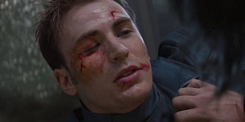 Captain America beat up and bloody from punches in the Winter Soldier