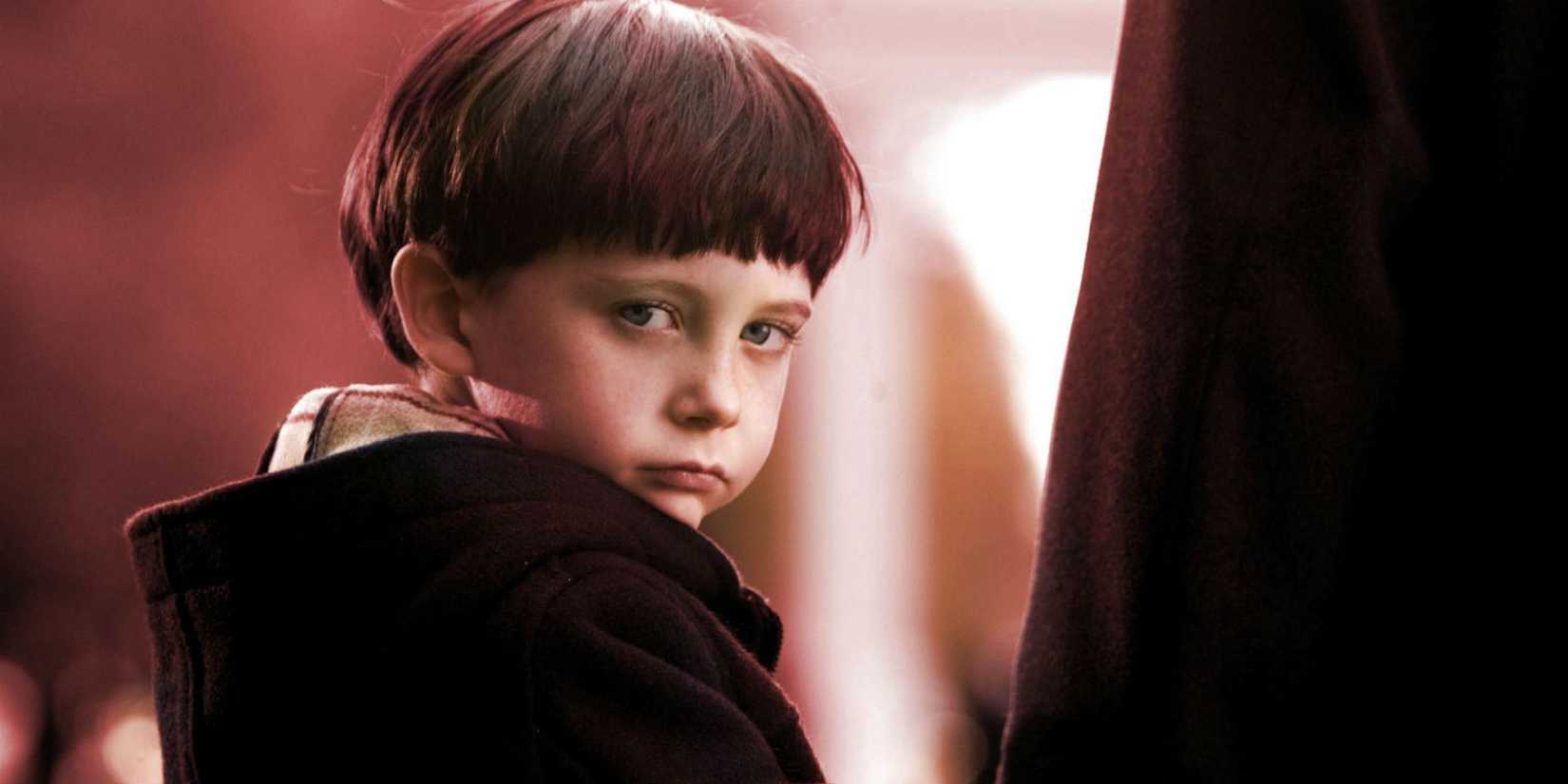 Damien looking over his shoulder