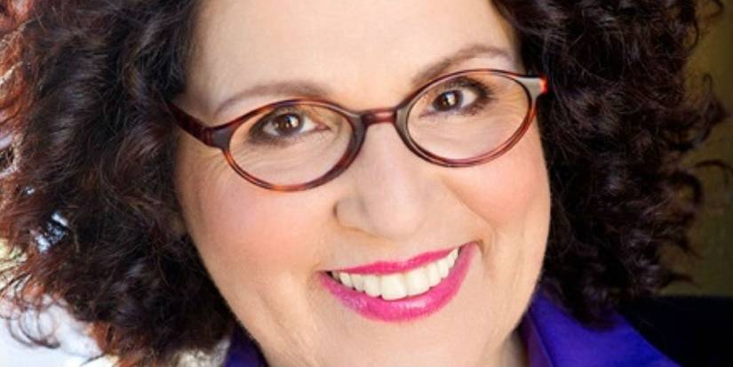 A closeup image of Carol Ann Susi smiling