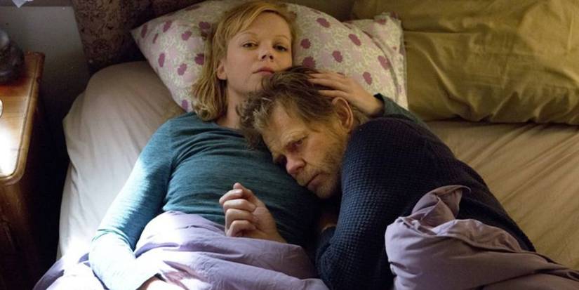 Frank is comforted by a woman in Shameless