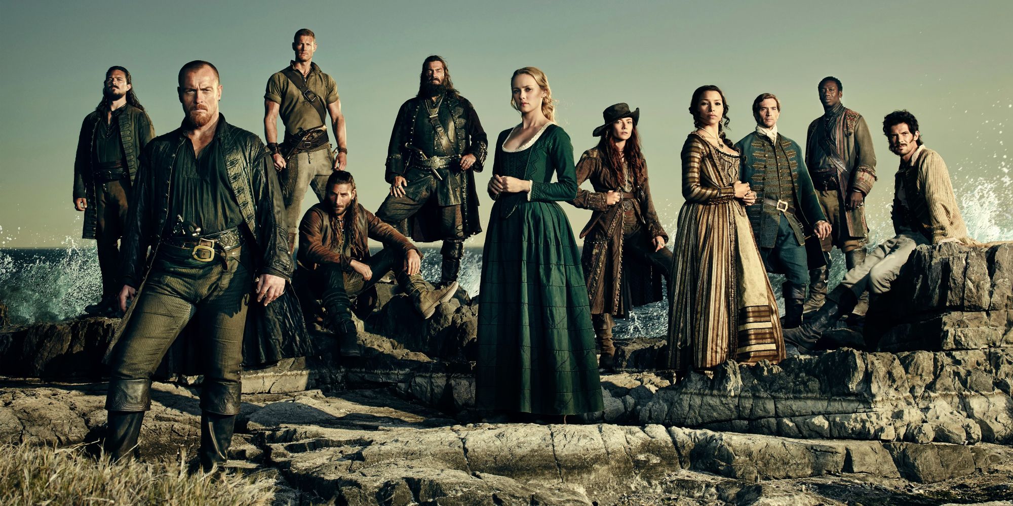 The cast of Black Sails poses for a picture.