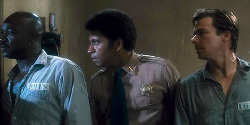 WIlson, Bishop and Wells look out a window in Assault on Precinct 13