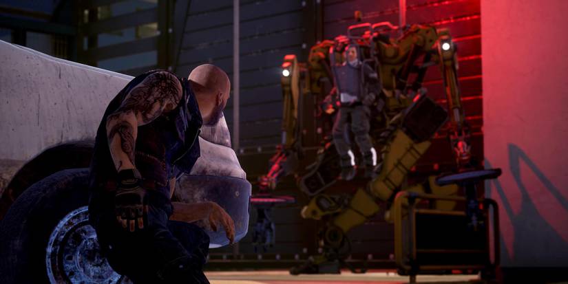 A man hides behind a car in Werewolf The Apocalypse