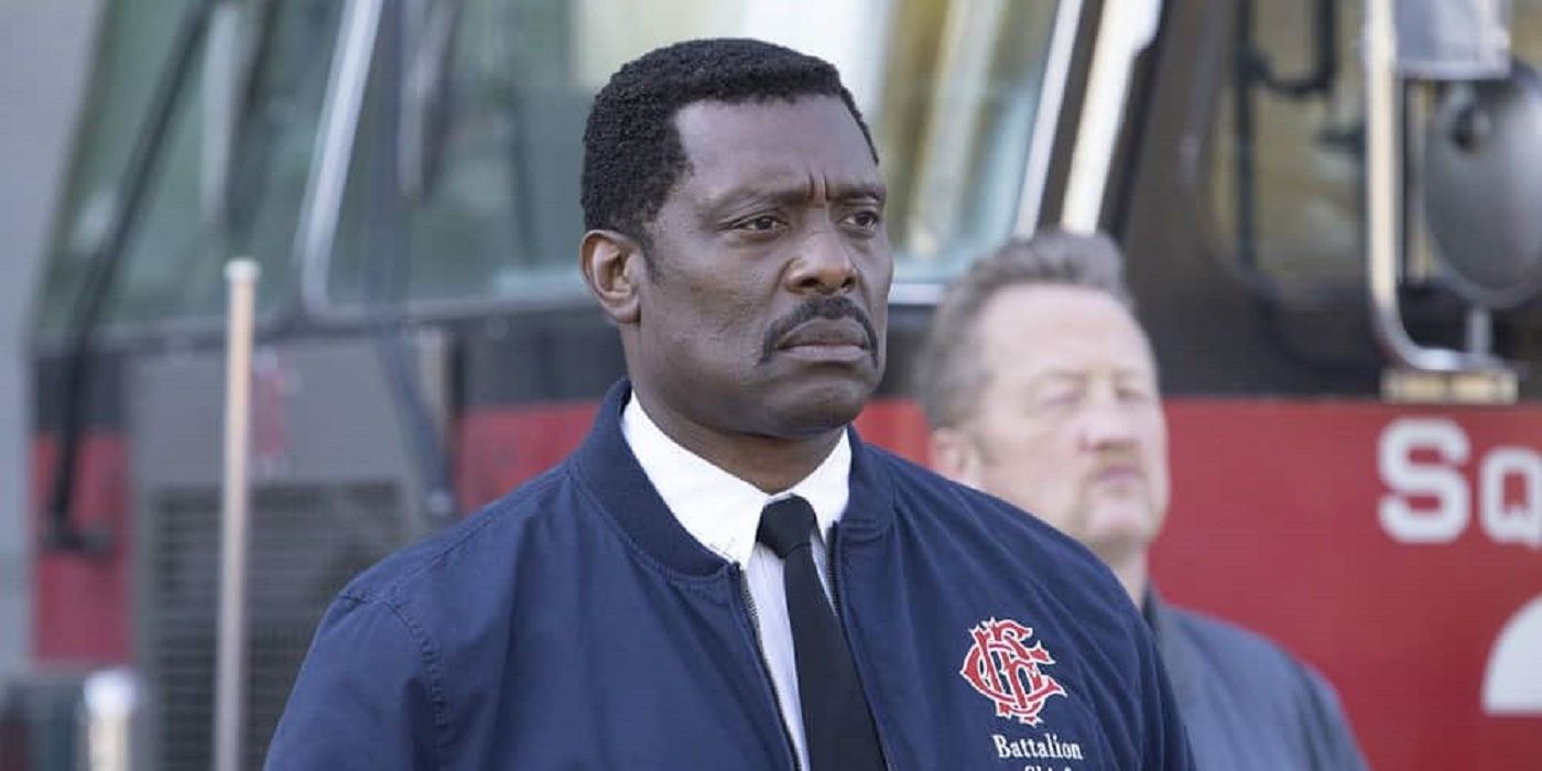 Wallace Boden looking stern in front of a fire truck in Chicago Fire