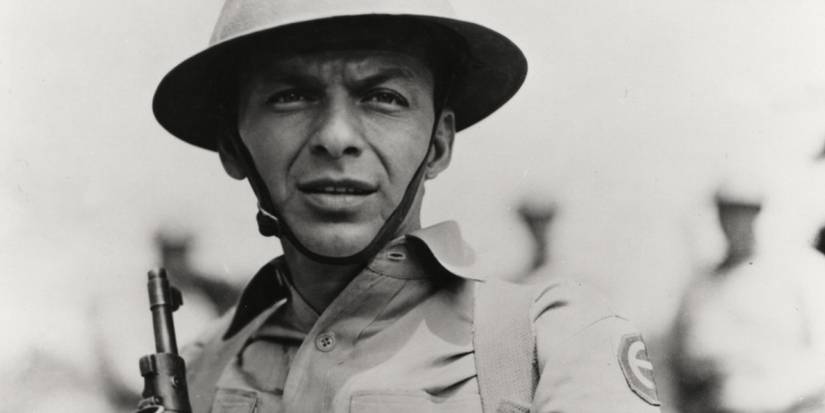 Angelo Maggio (Frank Sinatra) wearing an army helmet in From Here to Eternity