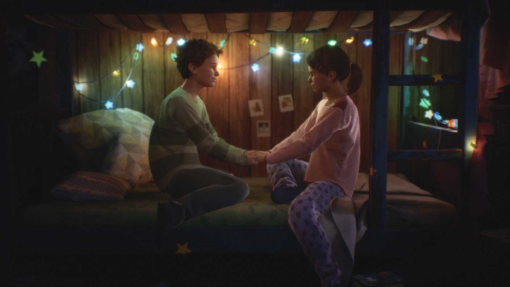 Alyson and Tyler hold hands in a Bunk Bed in Tell Me Why.
