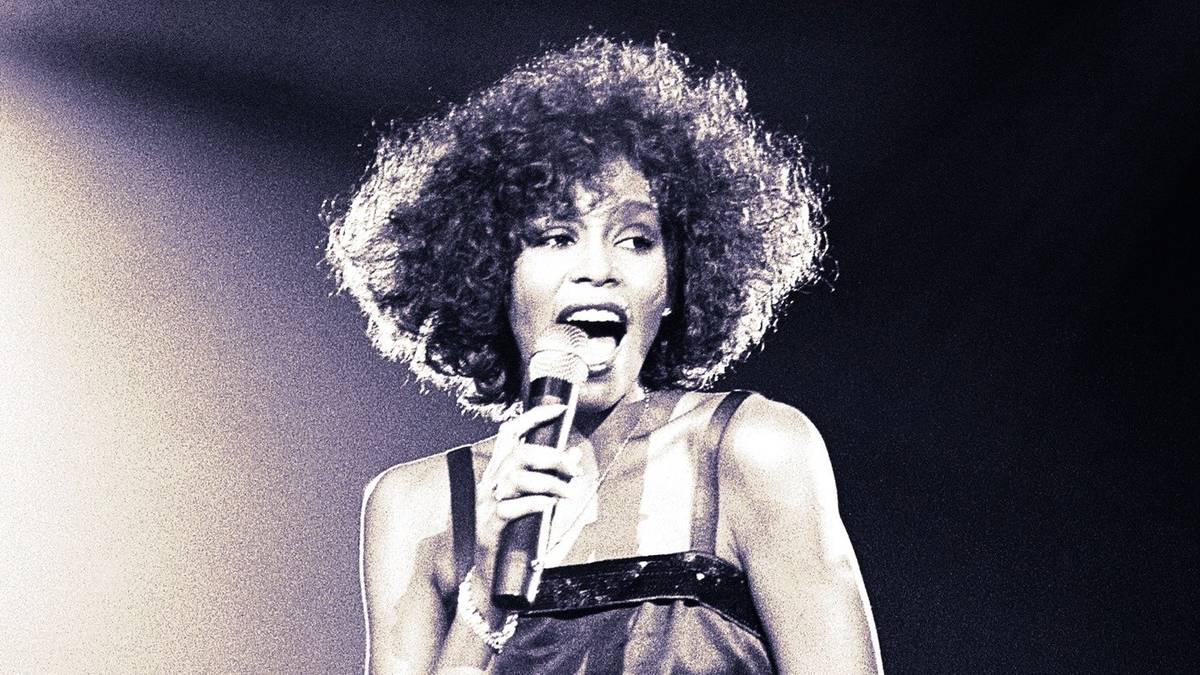 Whitney Houston performing on stage