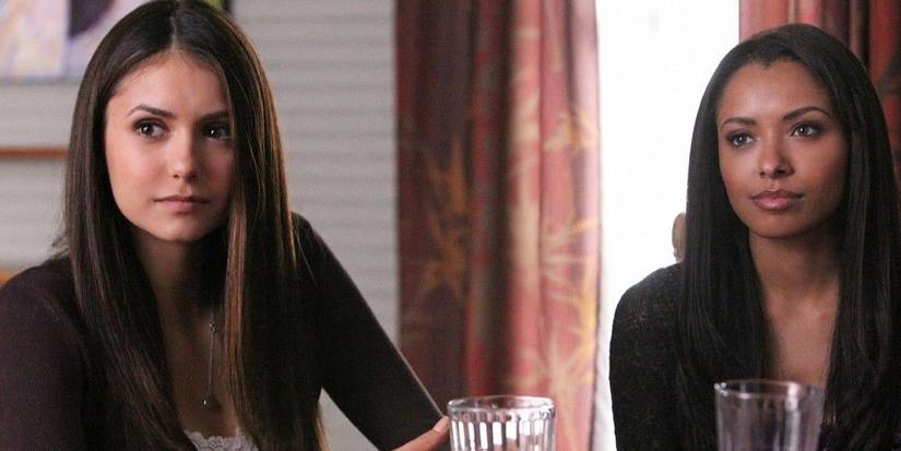 Bonnie and Elena sitting together in The Vampire Diaries