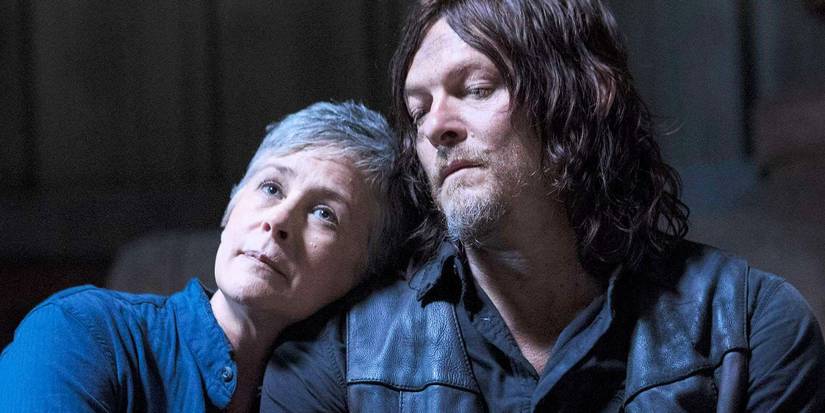 Carol (Melissa McBride) leaning on Daryl (Norman Reedus) in The Walking Dead