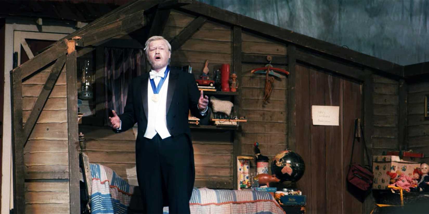 Jake sings on stage in I'm Thinking of Ending Things