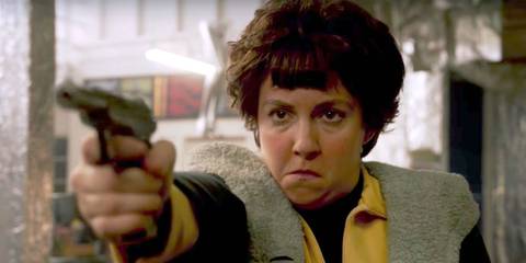 Valerie Solanas pointing a gun in American Horror Story Cult