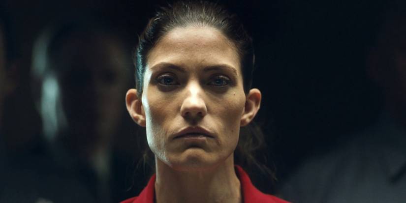 Jennifer Carpenter as Erica Shepherd wearing an orange jumpsuit and staring straight ahead in The Enemy Within.