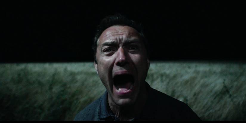 Jude Law as Sam screaming in the dark in The Third Day.