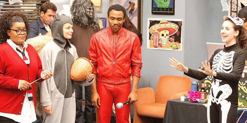Shirley as Harry Potter, Britta as a squirrel, Troy as Eddie Murphy, and Annie as a skeleton