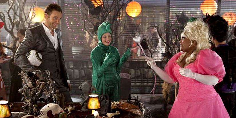 Jeff dressed as David Beckham speaking with Shirley, who's dressed as a princess in Community