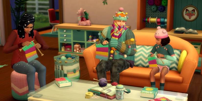 Sims 4 characters wearing knitted sweaters. 