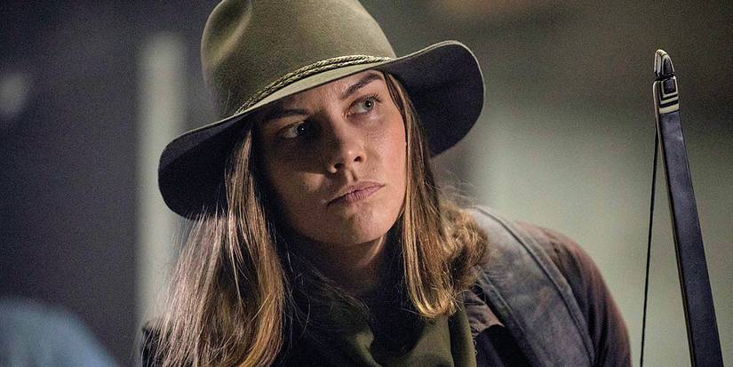 Lauren Cohan as Maggie in The Walking Dead Season 10 Episode 16 wearing a hat and carrying a bow