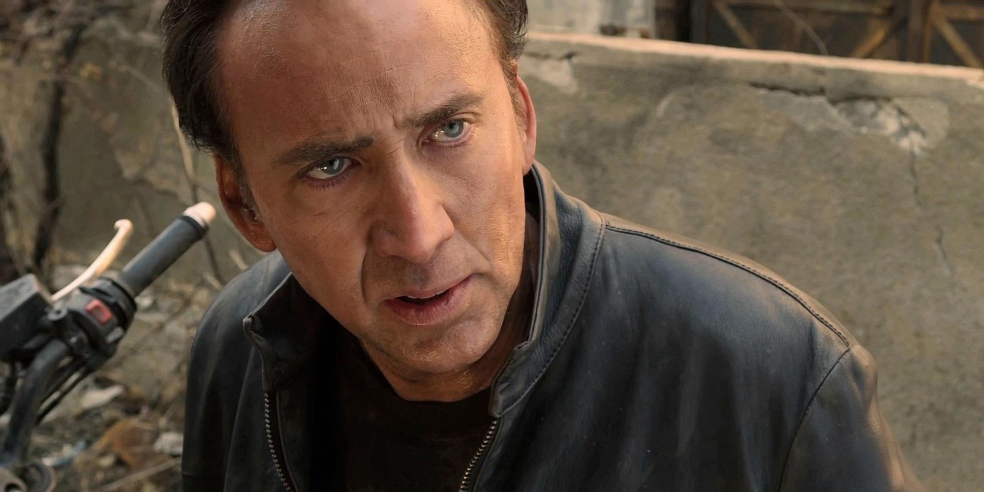 Close up of Nicolas Cage looking angry as Johnny Blaze in Ghost Rider