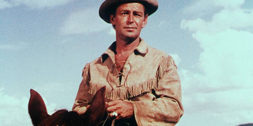 Shane (Alan Ladd) wearing a cowboy hat in Shane