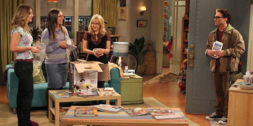 Penny, Amy, Bernadette, and Leonard in Penny's apartment from The Big Bang Theory