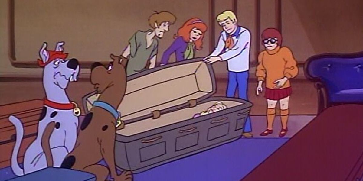 The Scooby gang along with Scooby Dum and a coffin in The Scooby Doo Show
