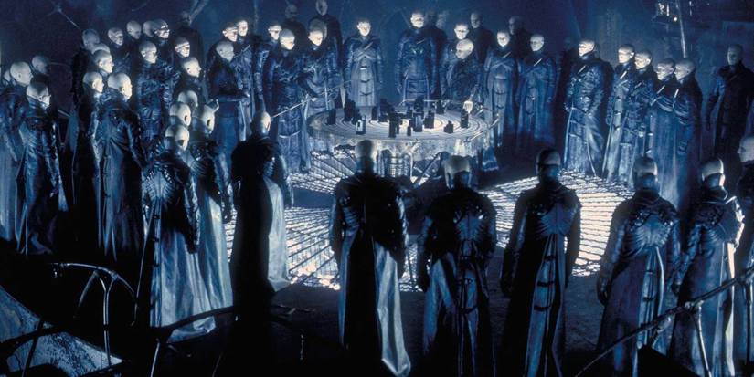 The Strangers gather for a meeting in Dark City