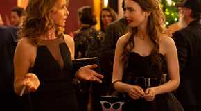 Emily and Sylvie in black dresses in Emily in Paris