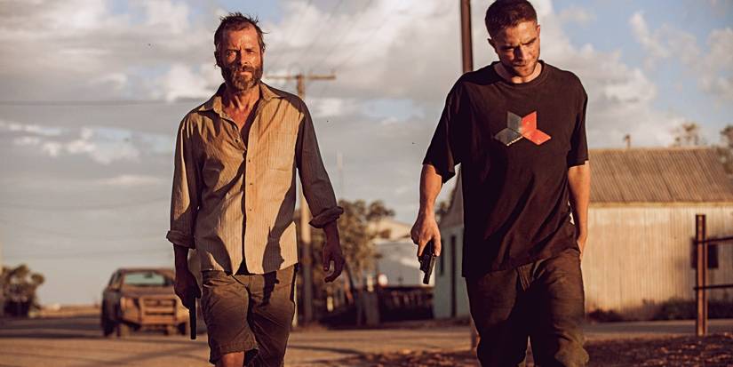 Guy Pearce as Eric and Robert Pattinson as Rey in a scene from The Rover.