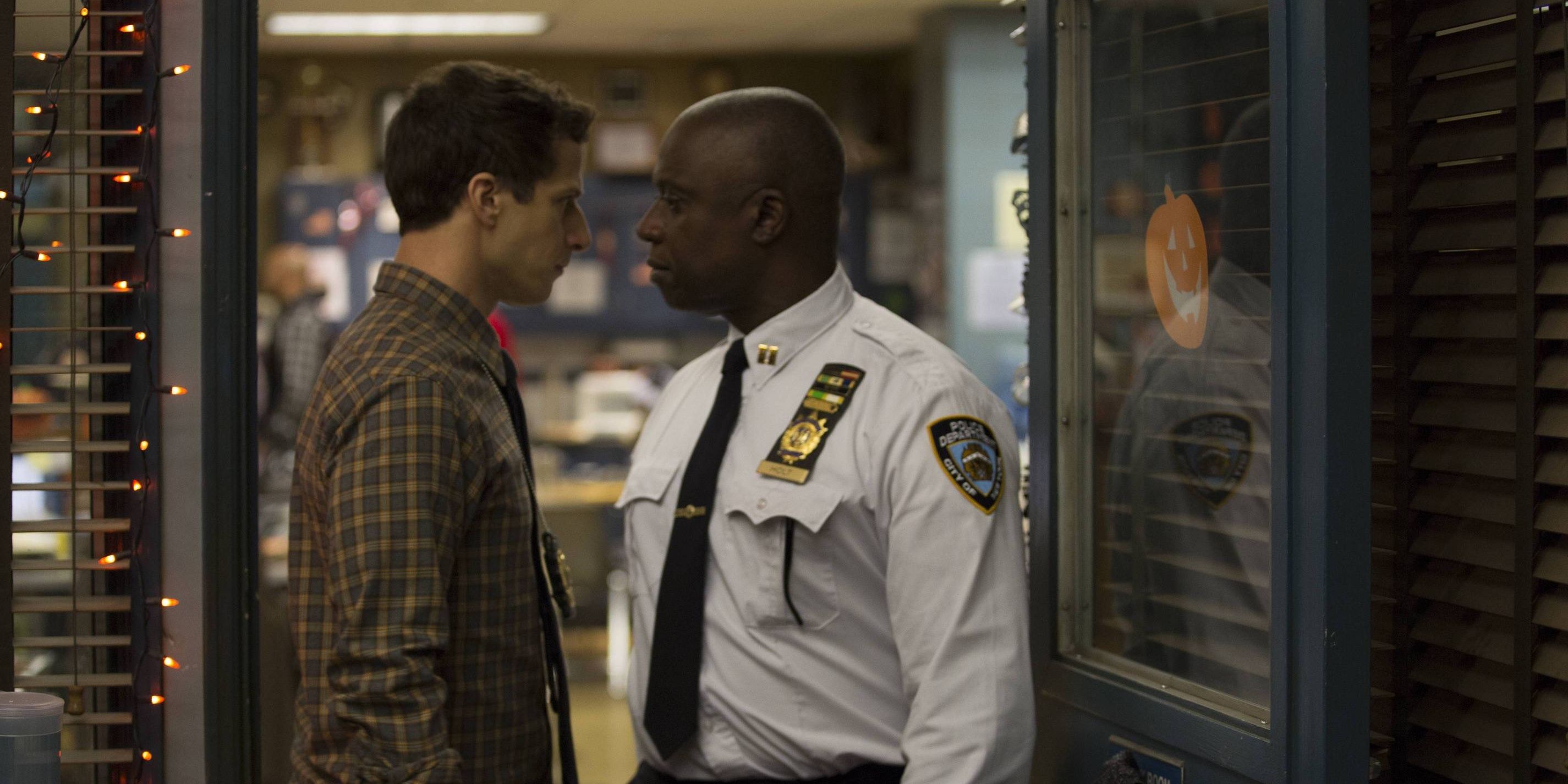 Holt and Jake face to face during a Halloween Heist in Brooklyn Nine Nine
