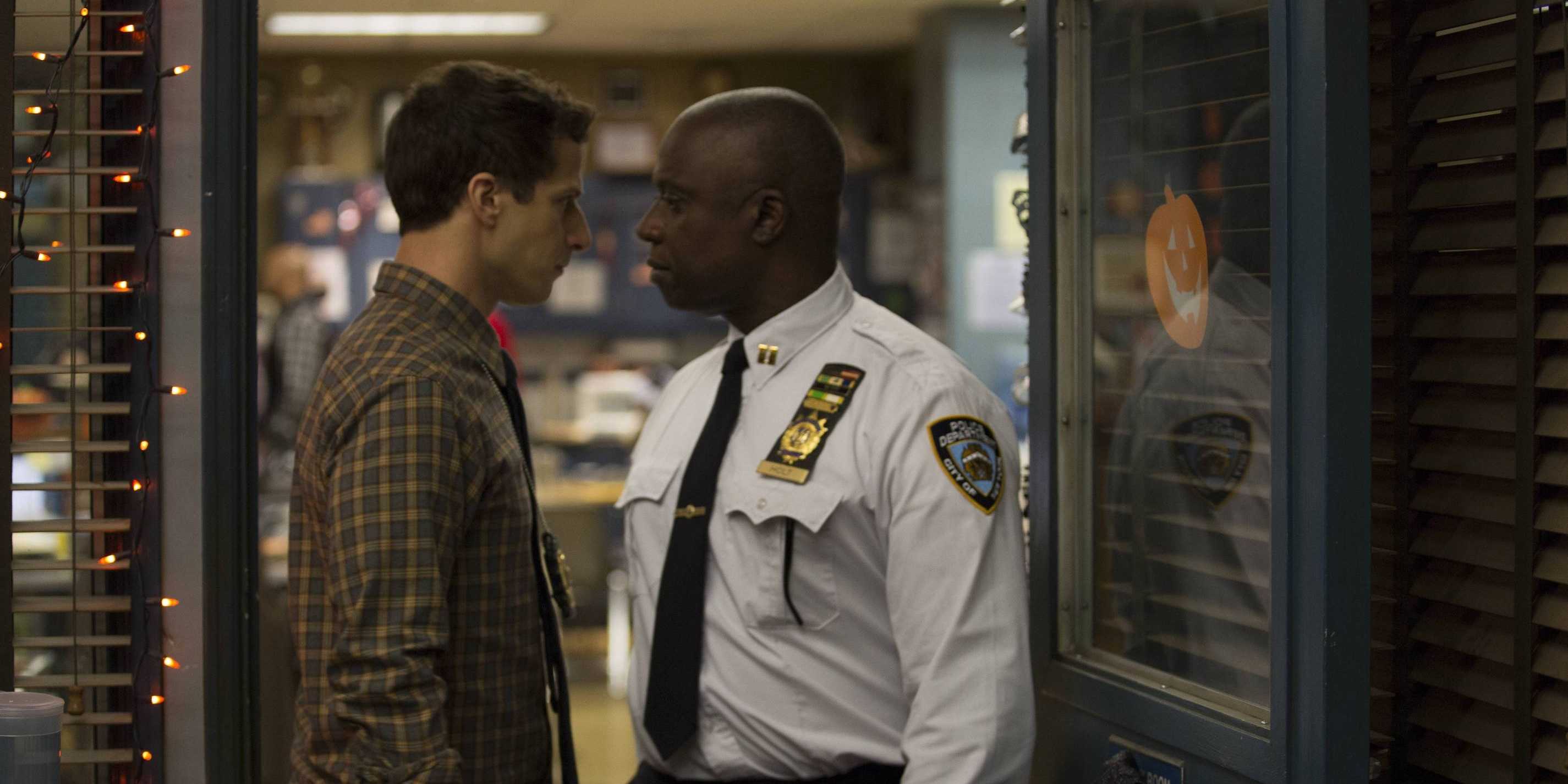 Holt and Jake face to face during a Halloween Heist in Brooklyn Nine Nine