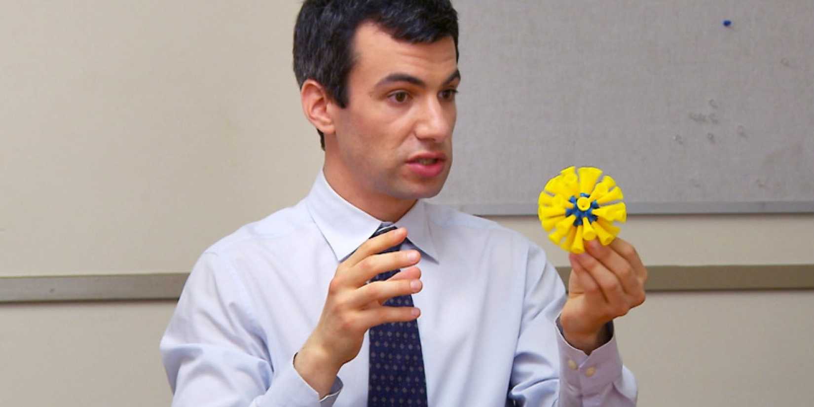 Nathan Fielder holding a toy in Nathan For You