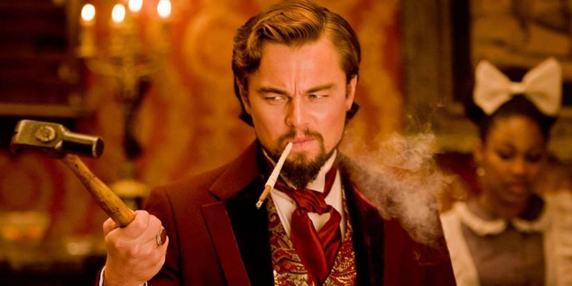 Leonardo DiCaprio as Calvin Candie threatening Django with a hammer in Django Unchained