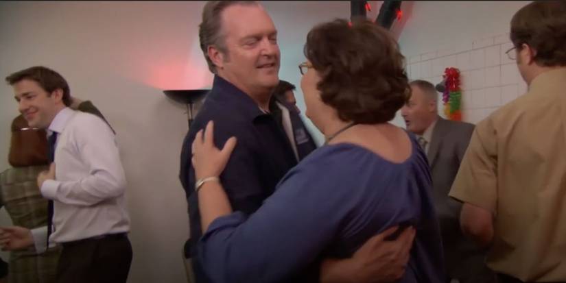 Phyllis (Phyllis Lapin) and Bob (Bobby Ray Shafer) dance in The Office