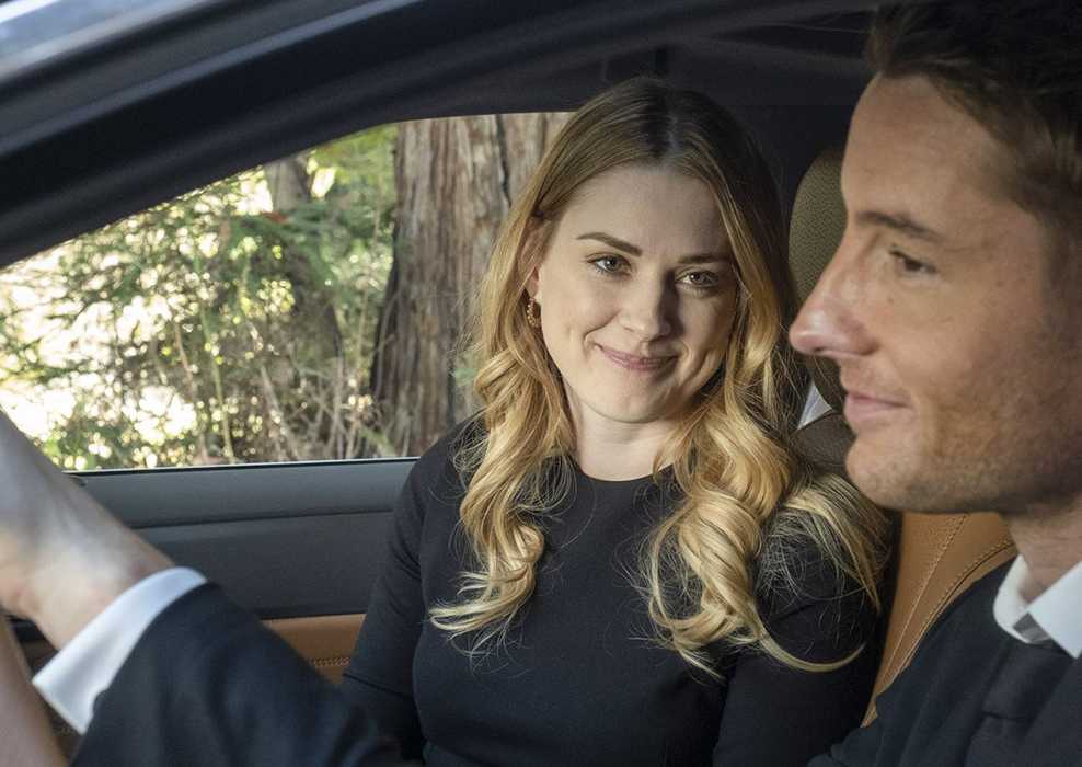 Sophie smiles at Kevin Pearson while sitting in his car in This Is Us