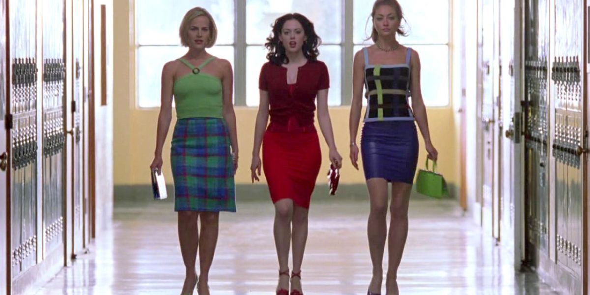 Courtney, Marcy, and Julie walking down the aisle in Jawbreaker
