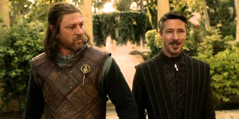 Lord Baelish walking next to Eddard Stark in Game of Thrones