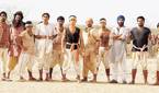 The team in Lagaan standing side by side outside and looking at the camera