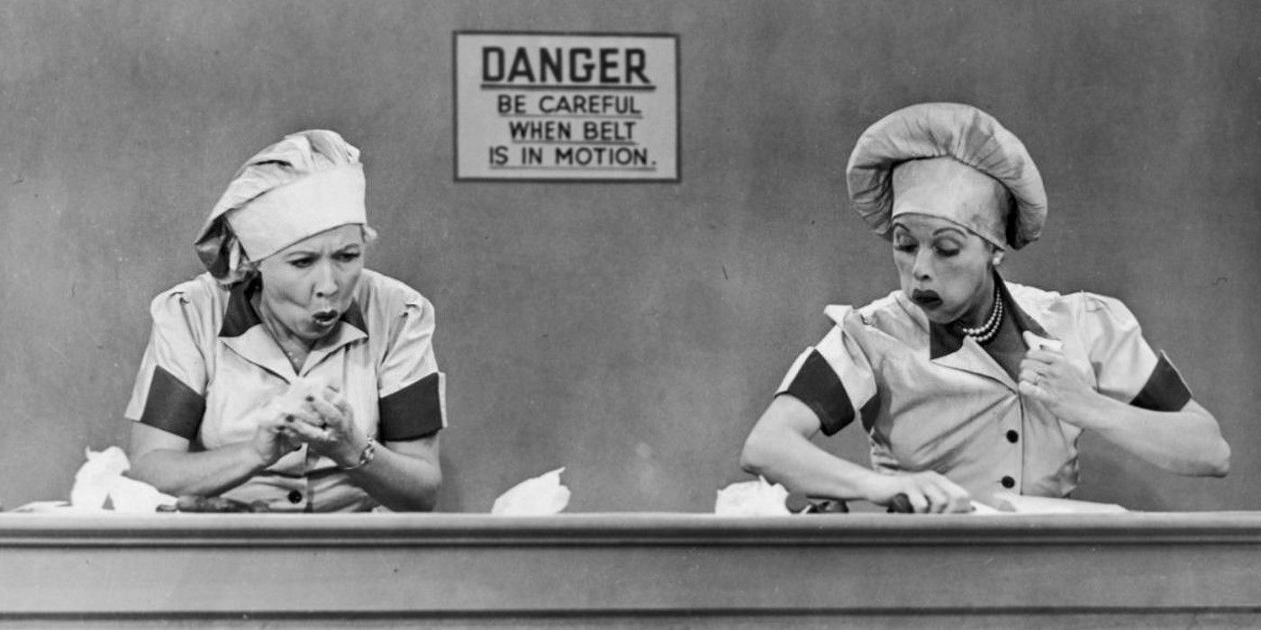 Lucille Ball as Lucy and Vivian Vance as Ethel eating chocolate in I Love Lucy